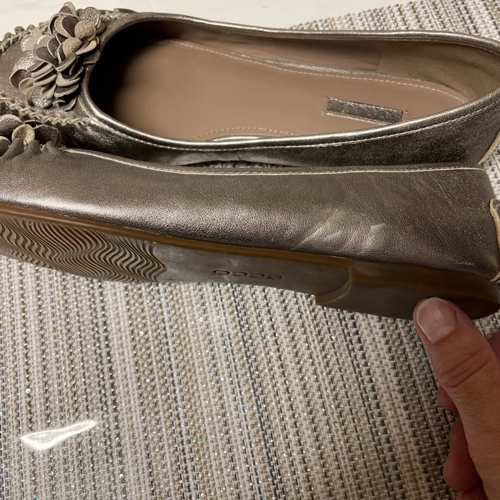 Metallic gold flats.